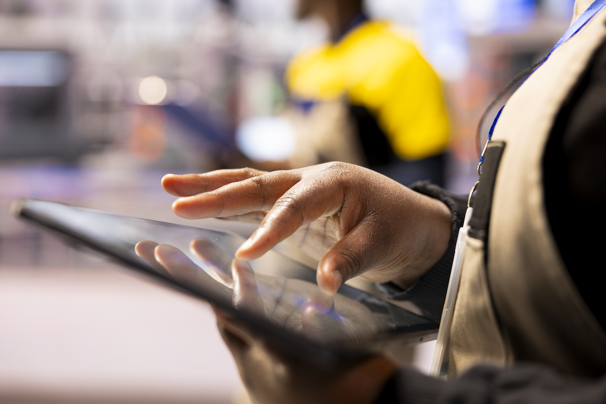 close up of engineer using tablet